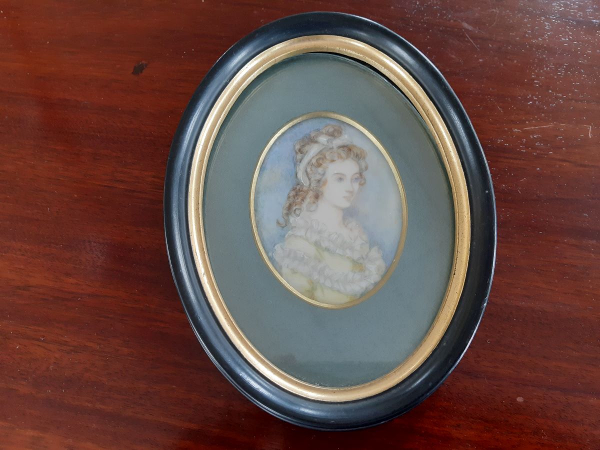 19th century watercolour of young woman in ebonised frame