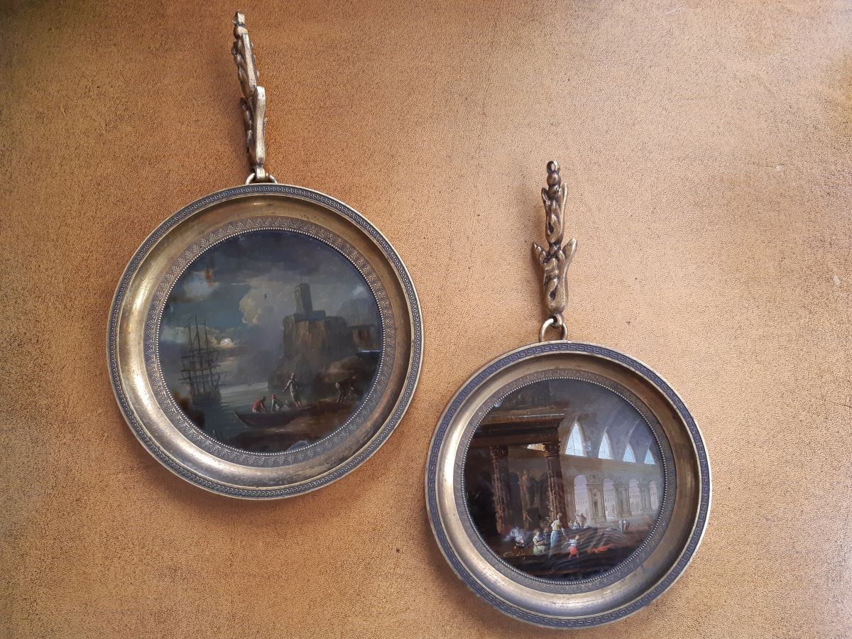 Pair of early 19th century reverse paintings, harbour scene & classical scene