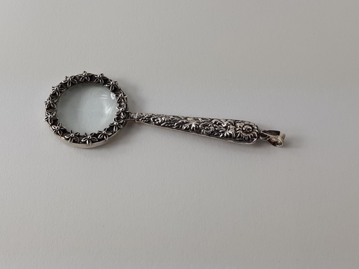 Silver pendant magnifying glass