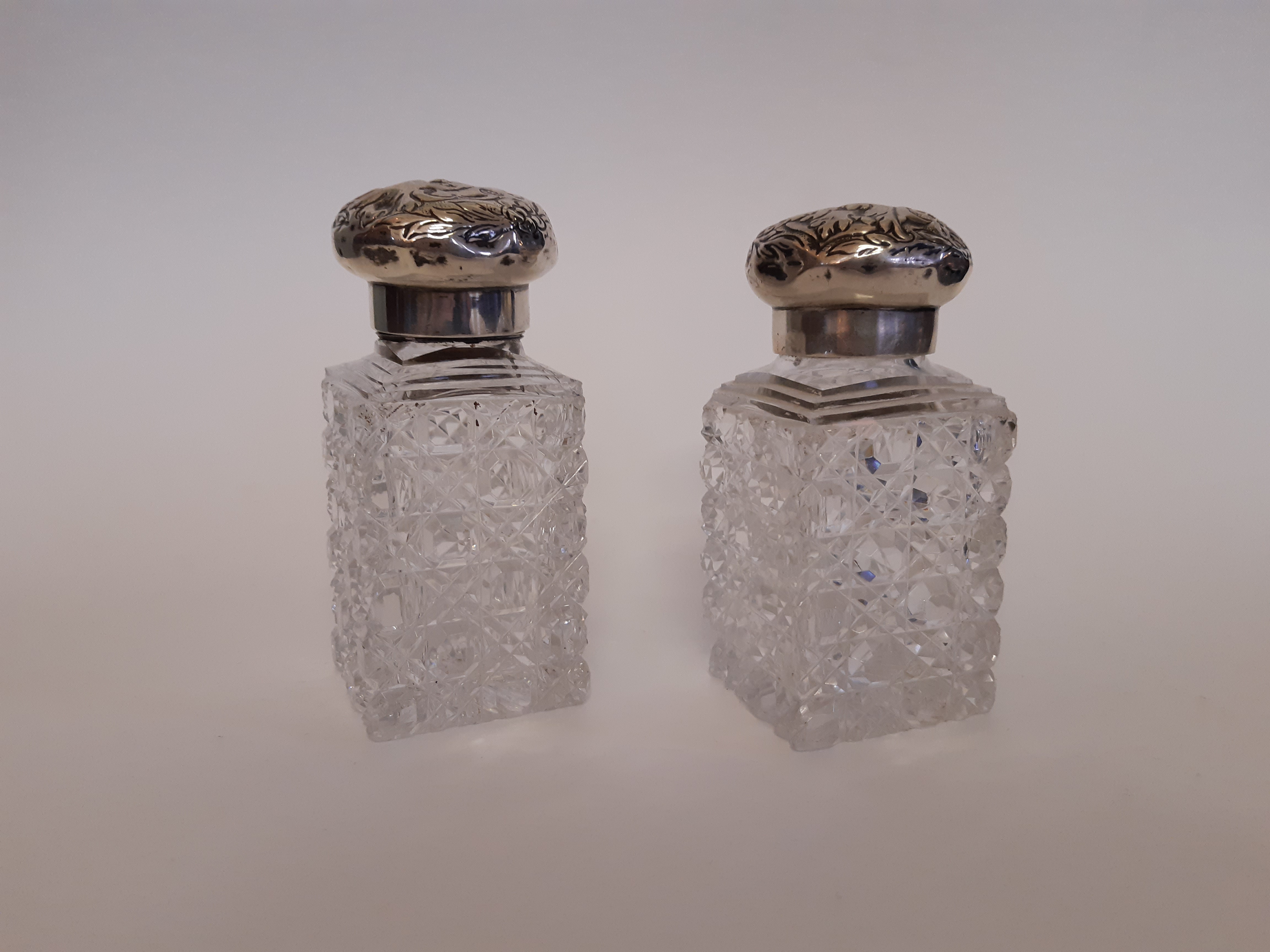 Pair of Victorian cut glass perfume bottles