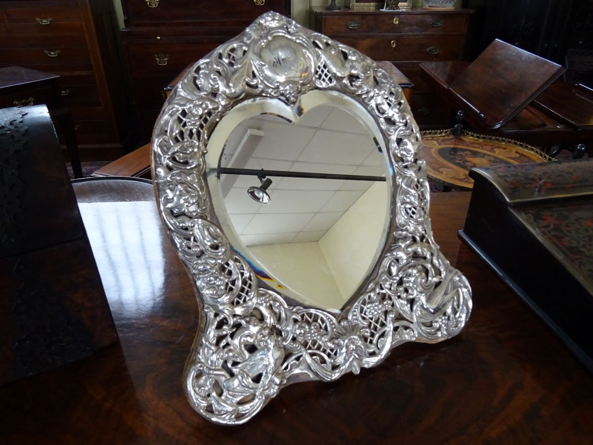19th century silver fronted heart-shaped mirror