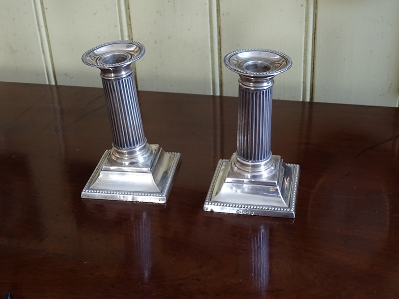 Pair of silver candlesticks