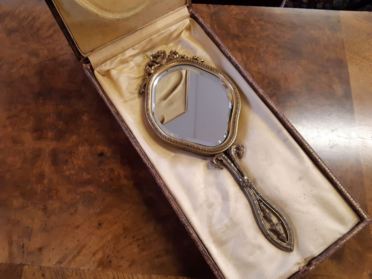 French gilt brass hand mirror
