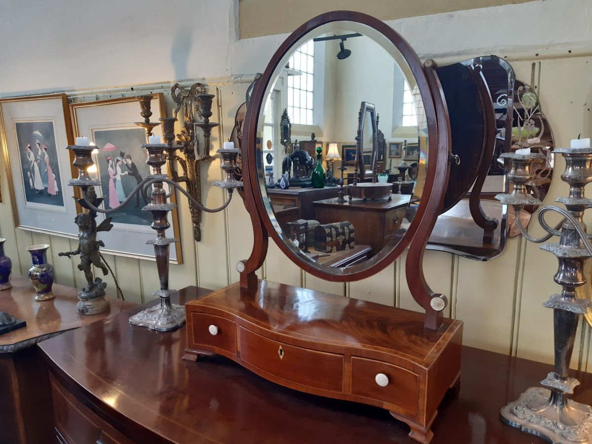 George 111 mahogany serpentine mirror