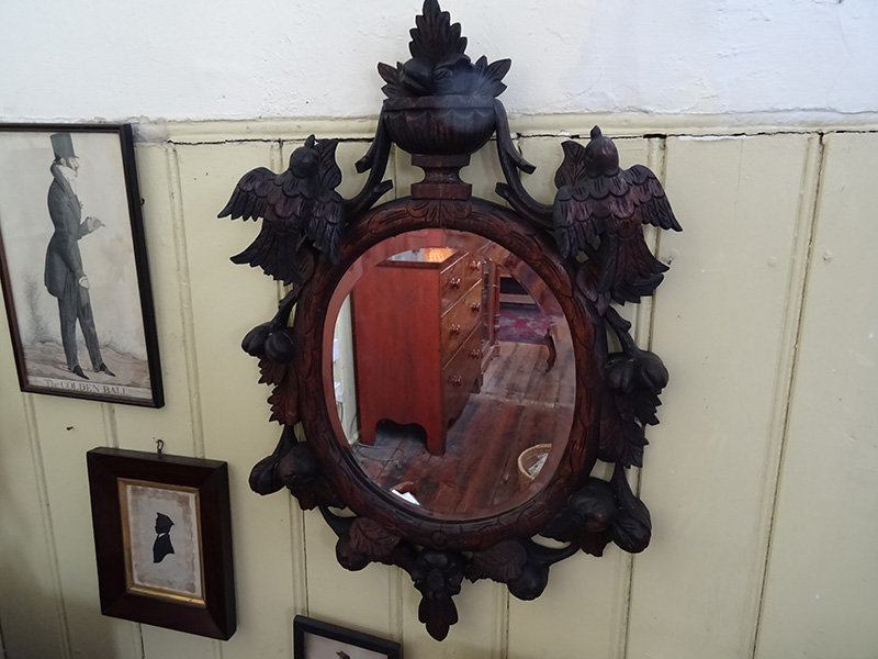 Ornate oak bevelled mirror, possibly Black Forest