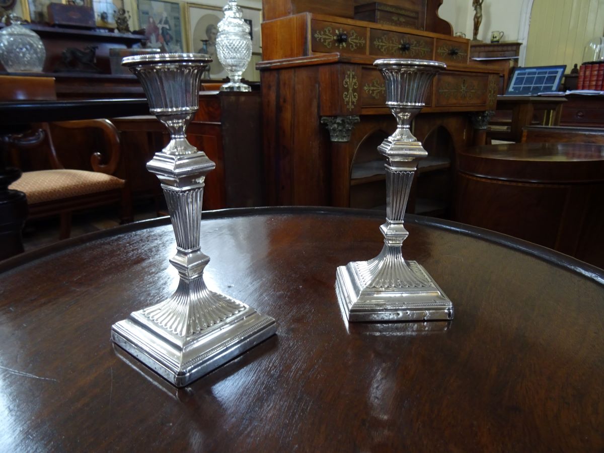 Pair of Victorian silver candlesticks