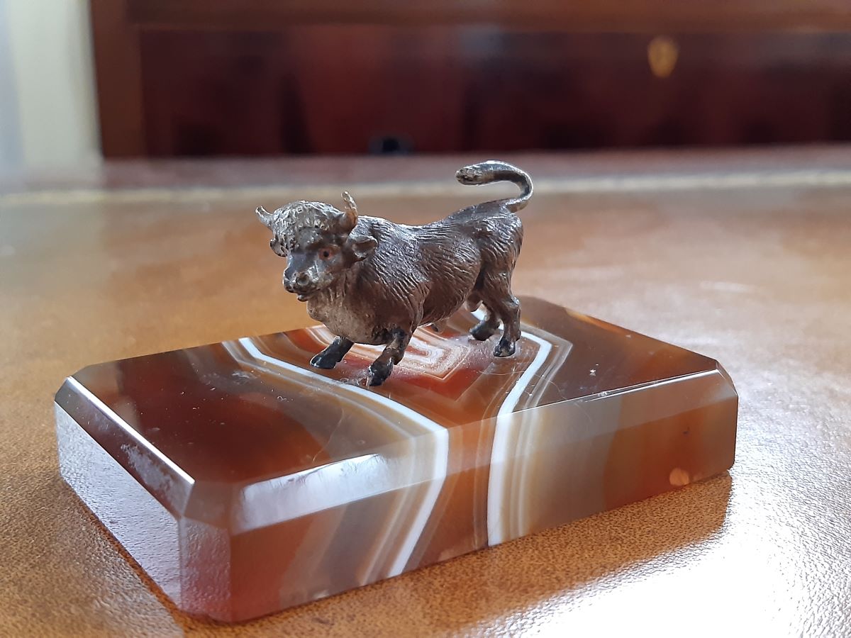Cold painted bronze miniature bull, agate plinth