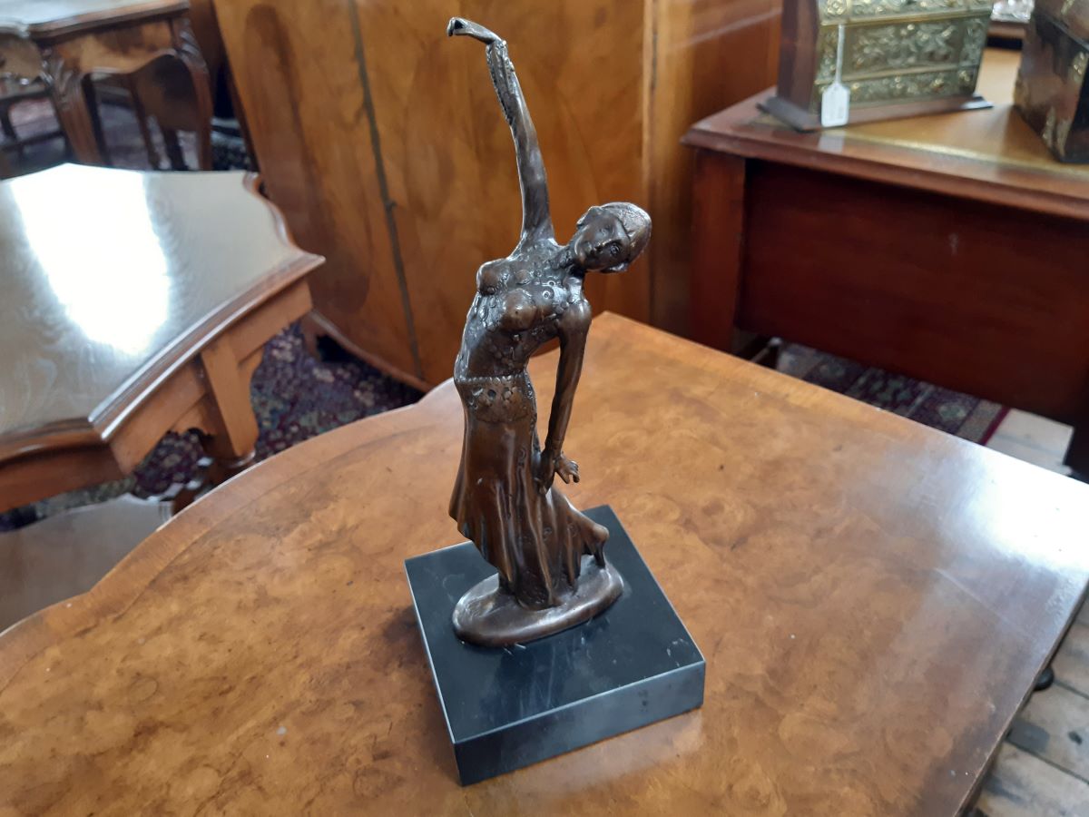 Bronze sculpture of an Art Deco lady on marble plinth