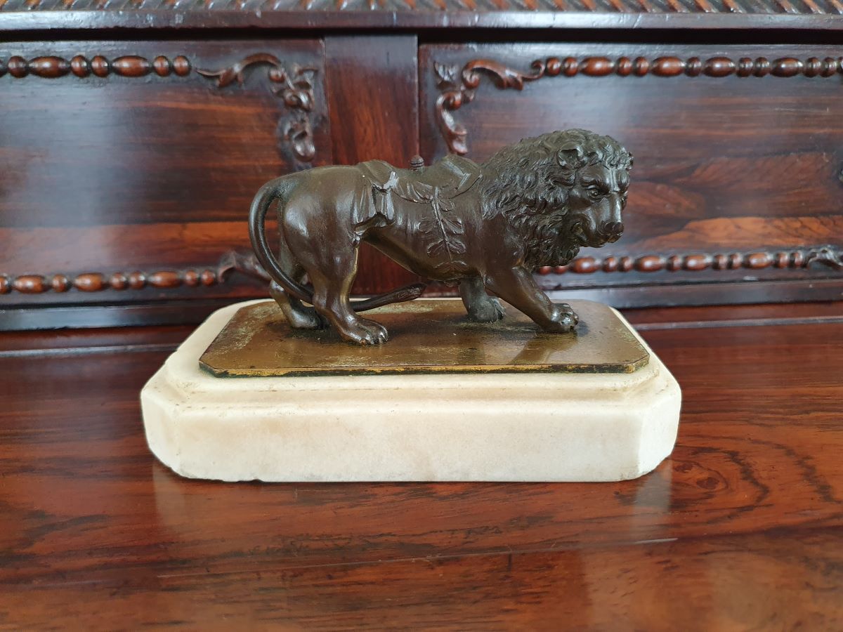 19th Century Bronze Lion Standing On A White Marble Base